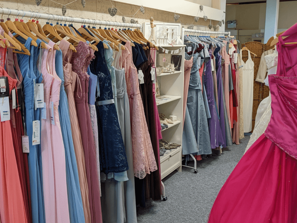 a selection of dresses on a rail