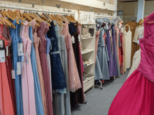 a selection of dresses on a rail