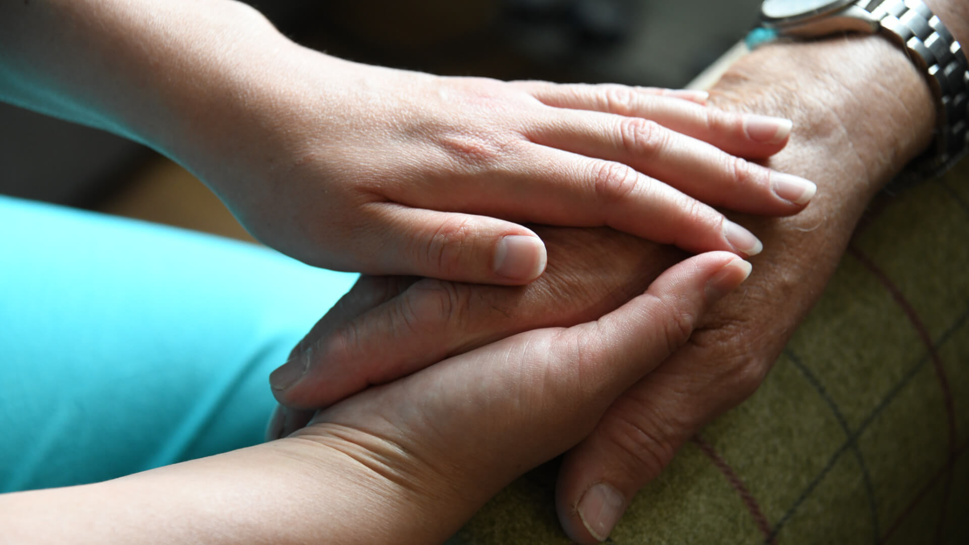 close up photo of two hands in hand